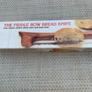 Vintage Bread Knife Crafted From Wood and Famous for Use Cutting Loaves of Bread